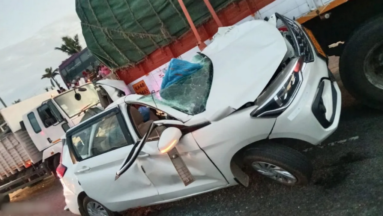 Car Crashes into Parked Truck on Highway