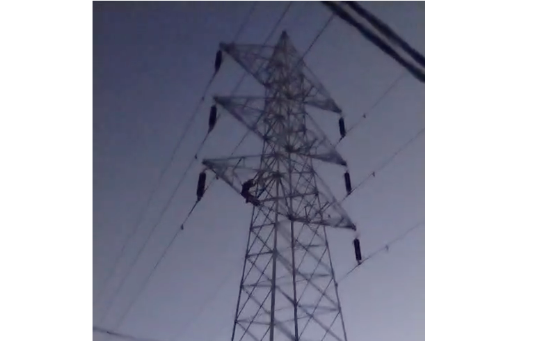 Angry at his wife's refusal to bid him farewell, the young man climbed a tower.