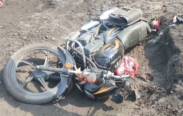 An explosive-laden vehicle ran over a motorcyclist; he died on the spot.