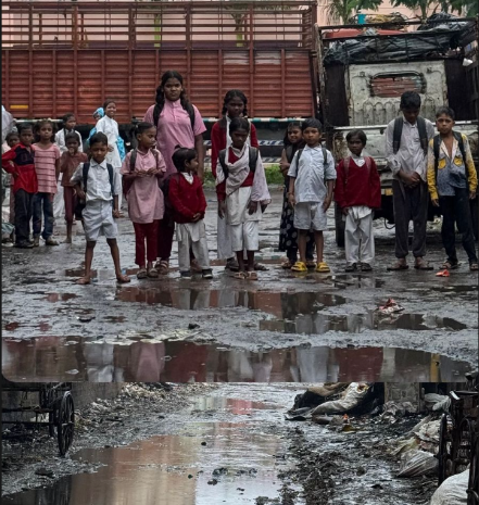 Meritorious Students Struggle Through Muddy Roads Despite Scoring 92%