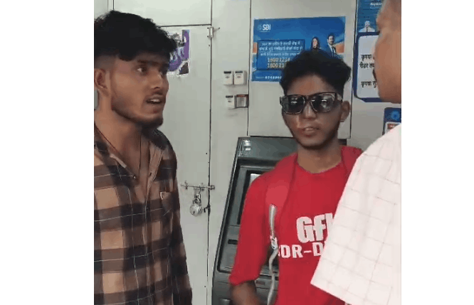 Two Suspects Caught Tampering with SBI ATM in Jalaun, CCTV Footage Under Probe