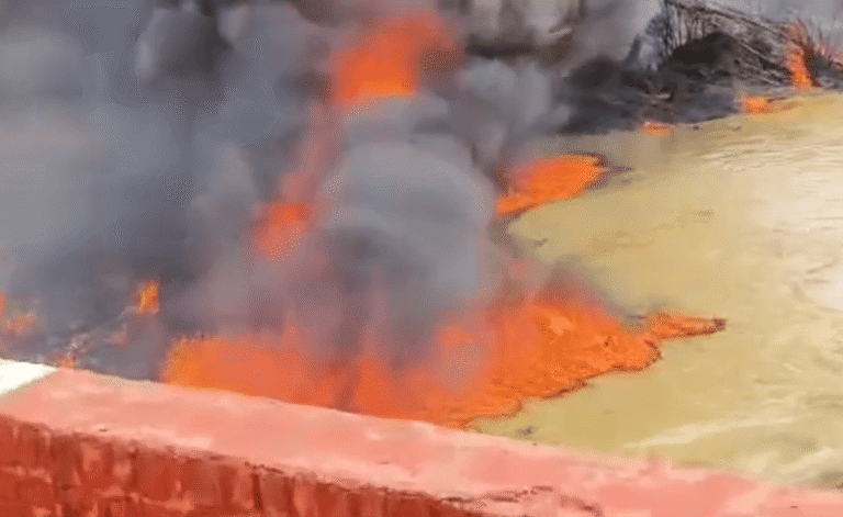 Massive Fire Erupts in Drain Near Pata Plant in Auraiya, Flames Rise from Water