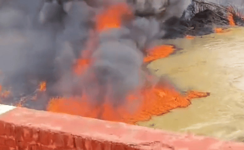 Massive Fire Erupts in Drain Near Pata Plant in Auraiya, Flames Rise from Water